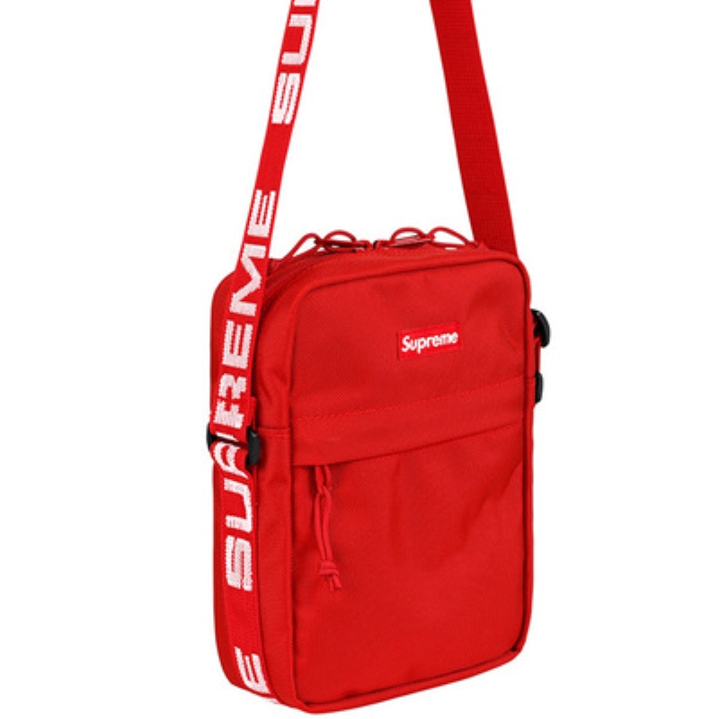 Red one-shoulder bag full of bouquets